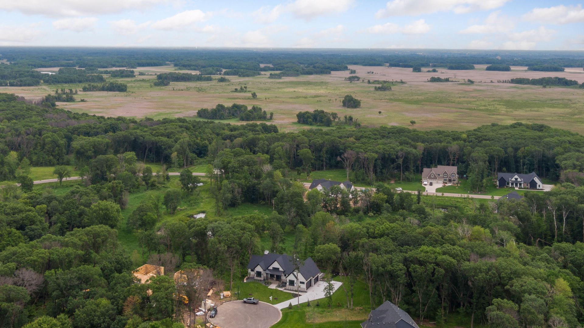 Aerial view of home on 3.35 private acres
